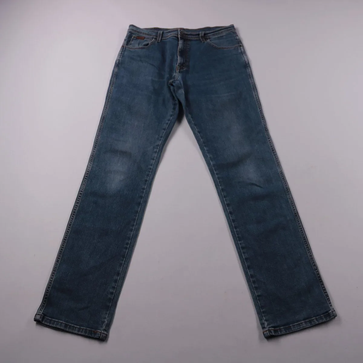 джинсы Wrangler